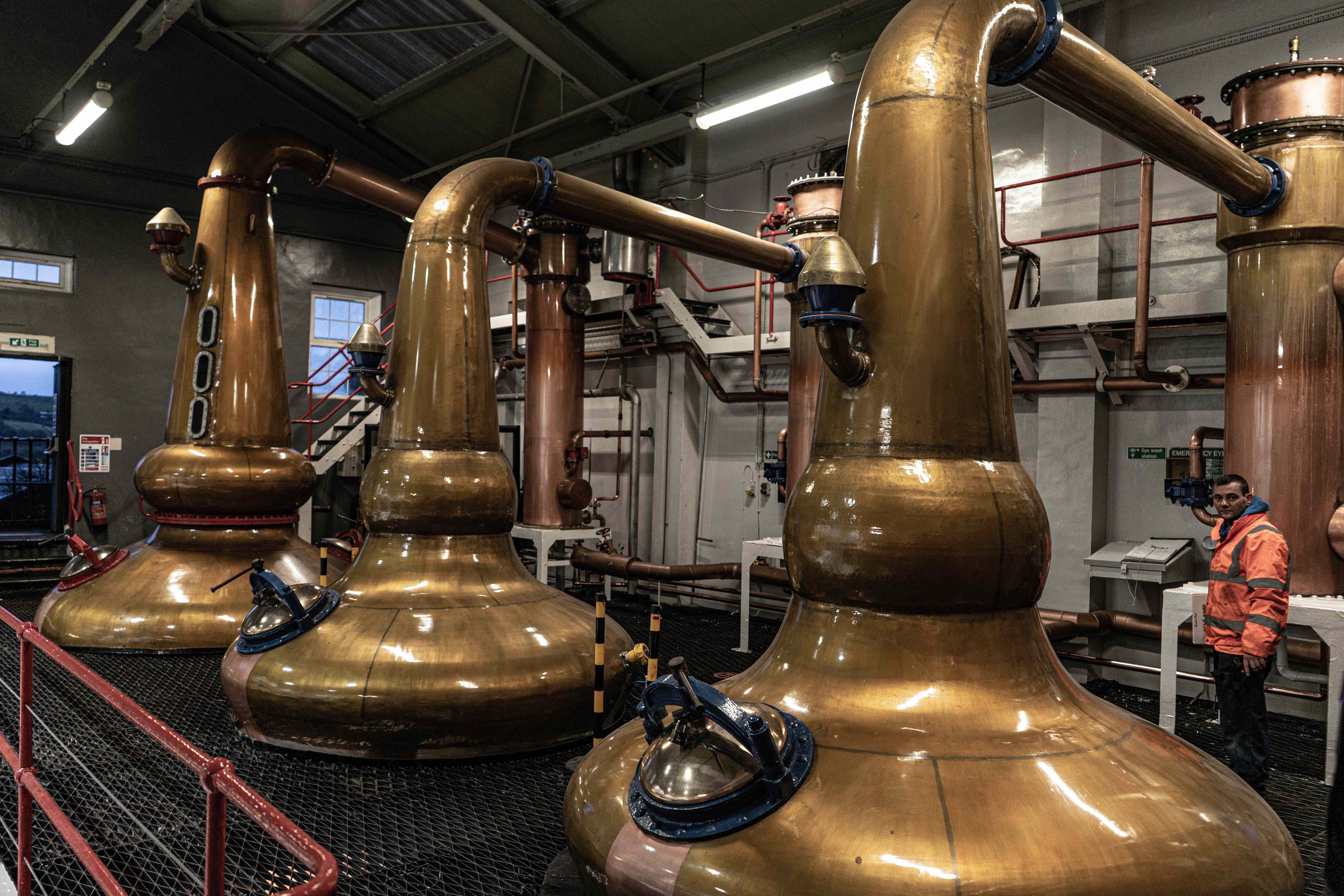 Tall copper pot stills at Glengoyne whisky distillery